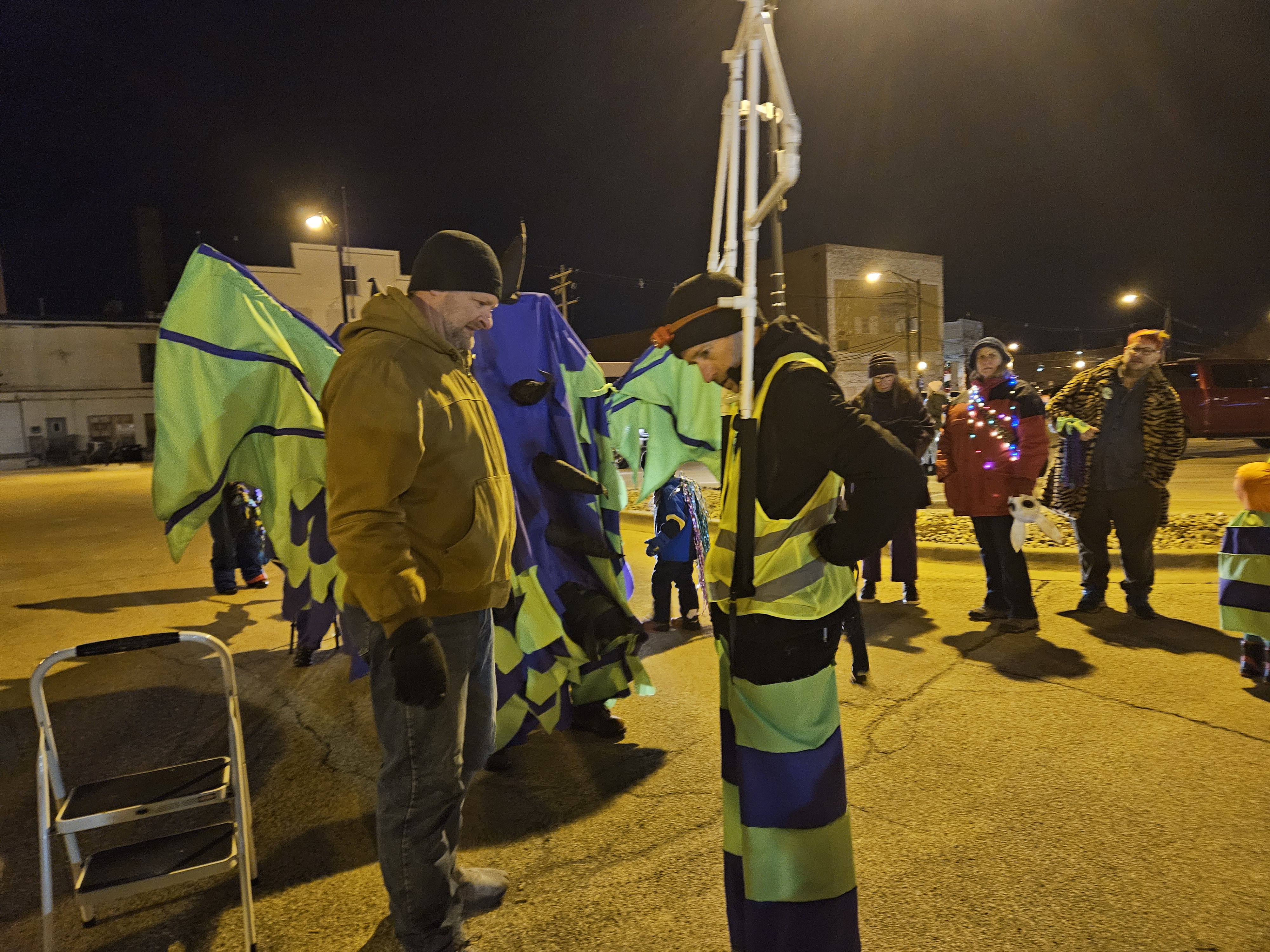 Gertie marching in the 2024 Champaign Parade of Lights